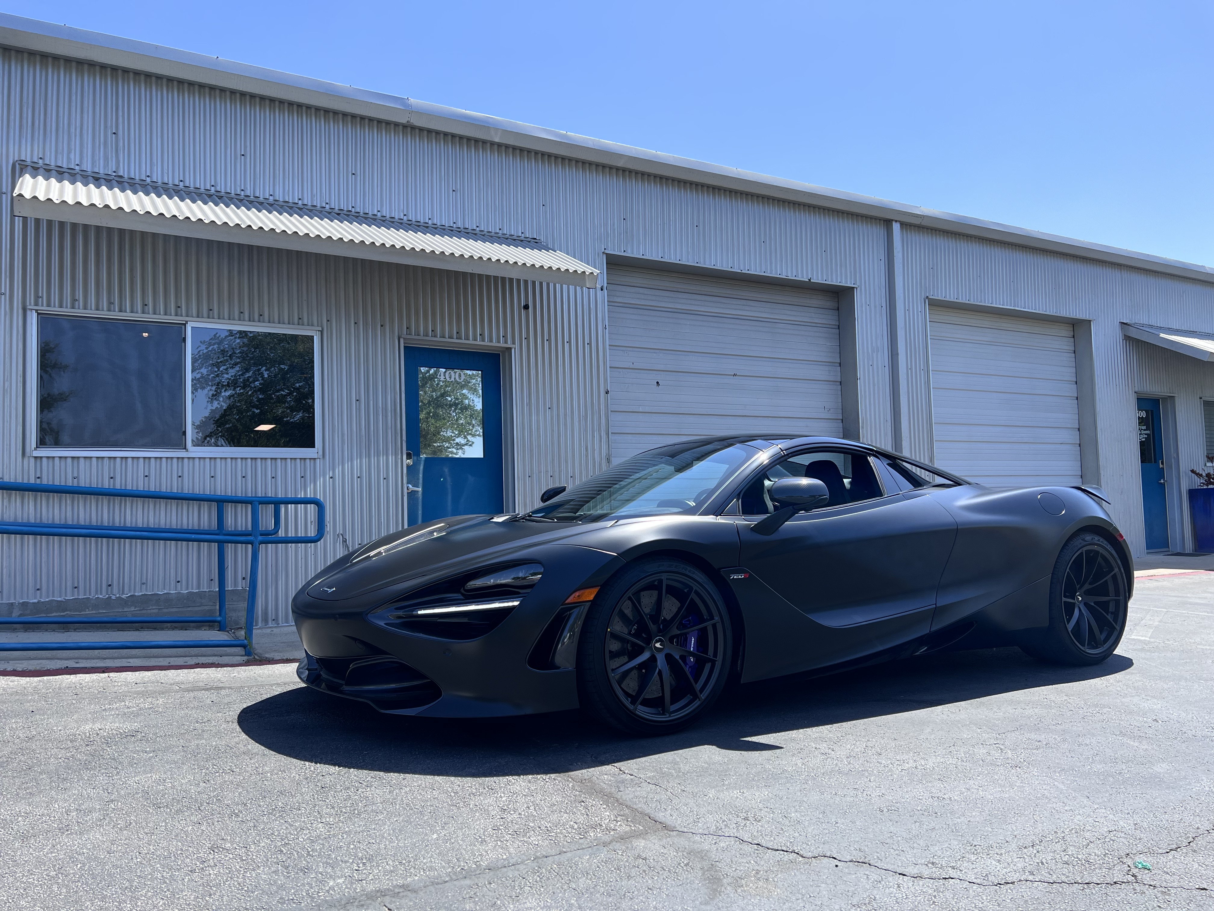 McLaren 720s with black satin vinyl